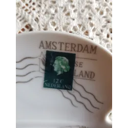 Vintage bladvorm schaaltje met afbeeldingen oude postzegels