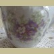 Frans brocante melkkannetje met paarse bloemetjes