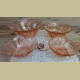 Nest van 4 vintage roze glazen schalen met reliëf