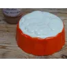 Vintage fel oranje / creme puddingvorm met fruitmotief